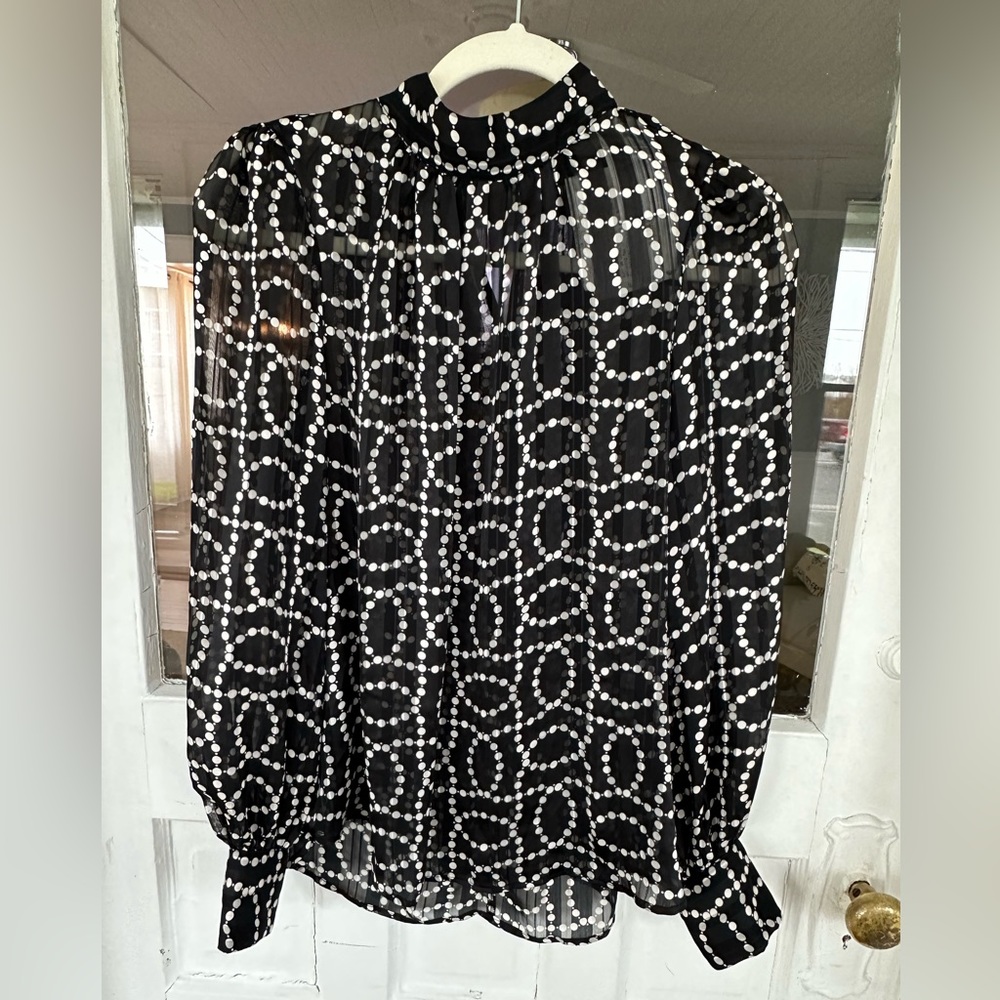 - Black and white long sleeved dress shirt